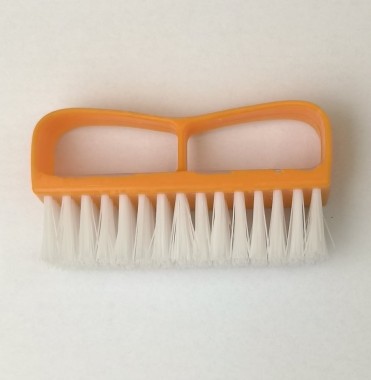 Brush for cleaning diapers